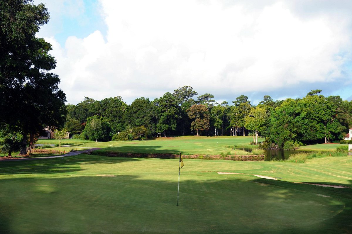 Golf course green with flag